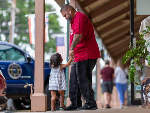 KT Protection Services protection specialist with a child.