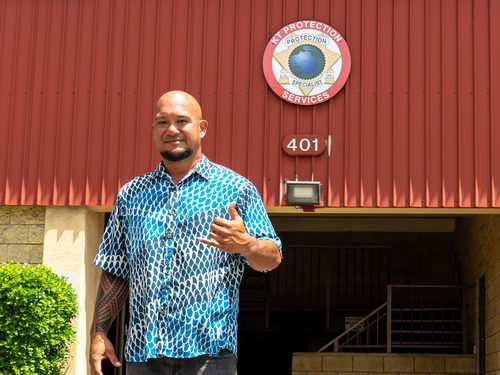 Standing in front of the offices