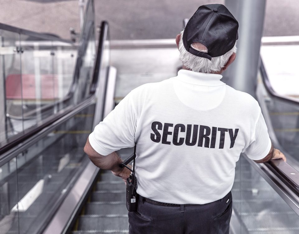 Security guard on an escalator