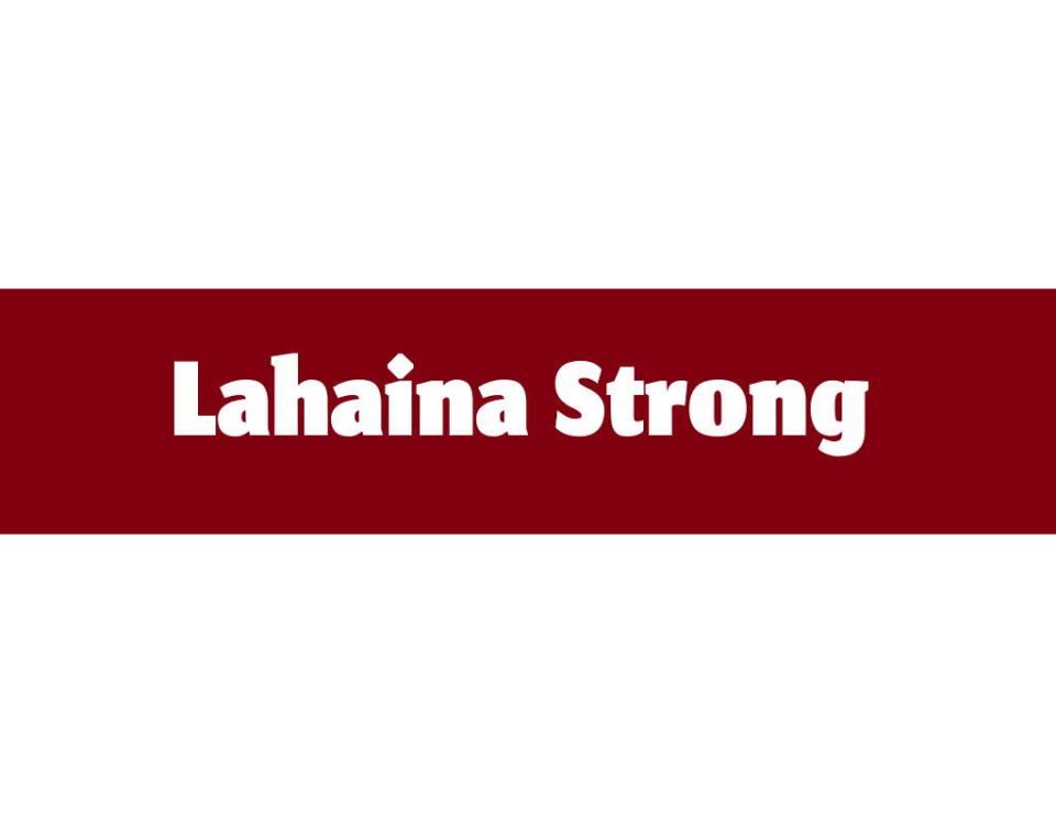 A red banner with white words that reads Lahaina Strong