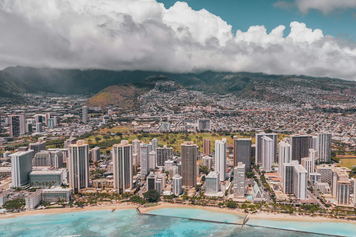 Honolulu with clouds and mountains in the background